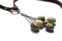 Pebbles pendant on leather necklace
